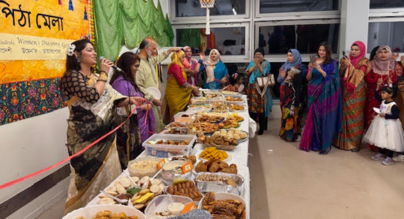 পিঠা উৎসবের উদ্বোধন করছেন রাষ্ট্রদূত নাহিদা সোবহান । ছবি - লেখক